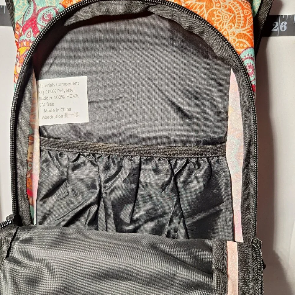 Vibedration Hydration Backpack w/o bladder -turquoise/orange pattern - Used